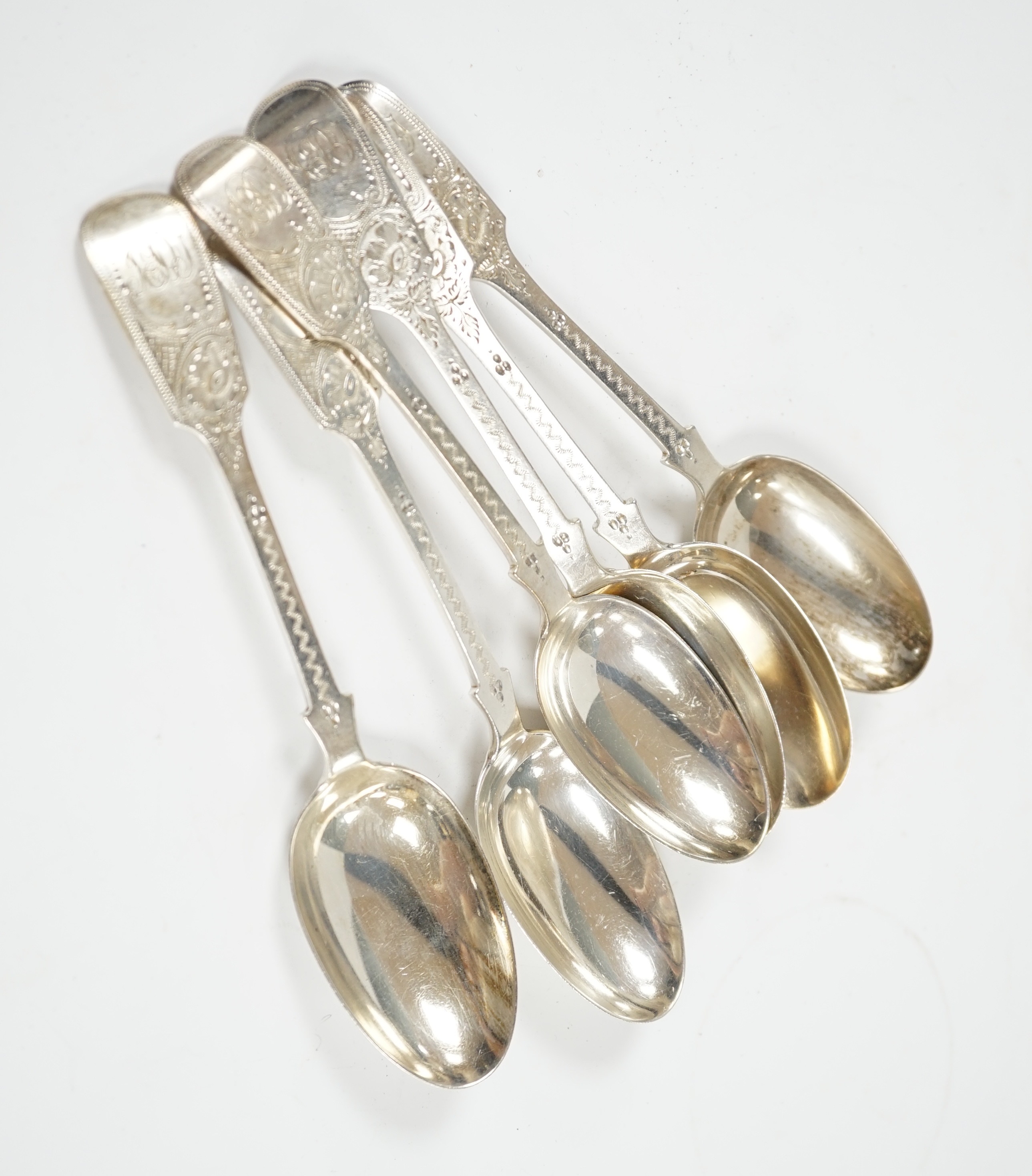 A set of six Edwardian bright cut engraved silver dessert spoons, Charles T. Maine Ltd, London, 1909, 17cm, 7.8oz. Condition - fair